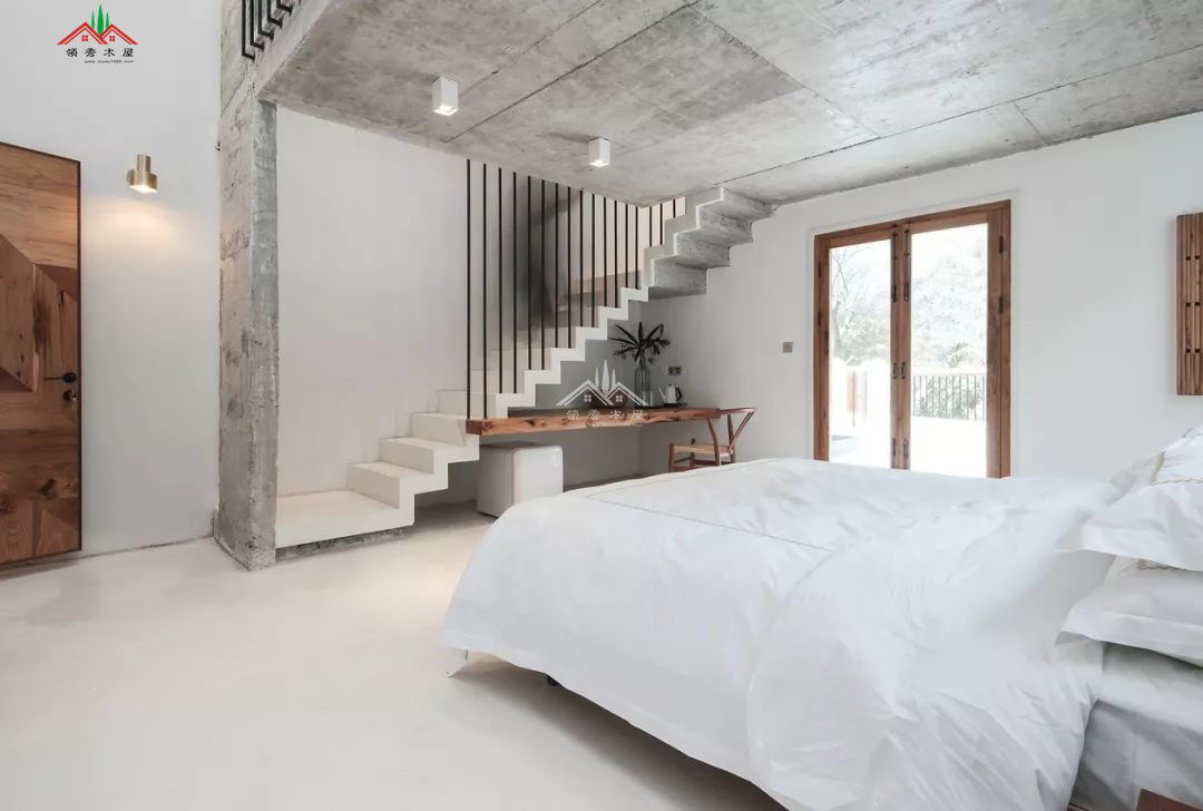 簡(jiǎn)約混磚木屋